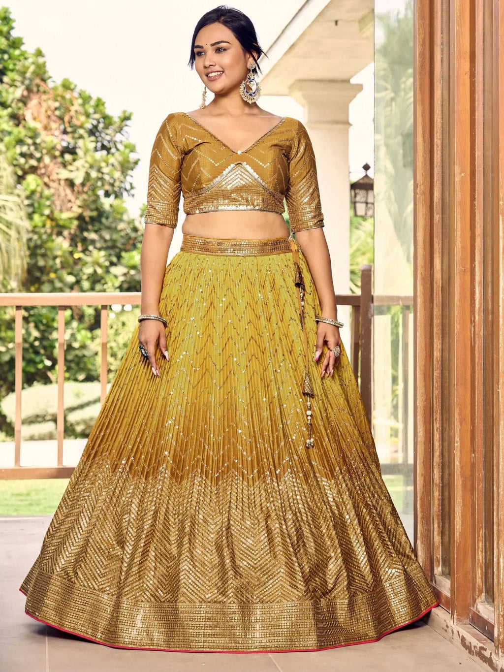 Outstanding Yellow Sequins Chinon Haldi Wear Lehenga Choli